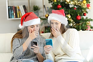 Worried women reading bad news in christmas