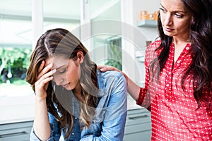 Worried young woman with friend