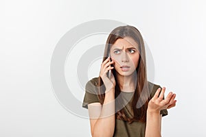 Worried young woman looks nervously, Female is nervous while talking on the phone, feels frustrated and worrying phone