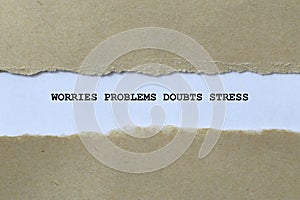 worries problems doubts stress on white paper