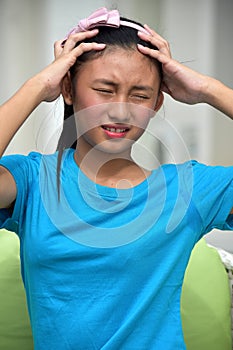 Worrisome Youthful Asian Girl
