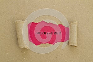 Worry-free written under torn paper.