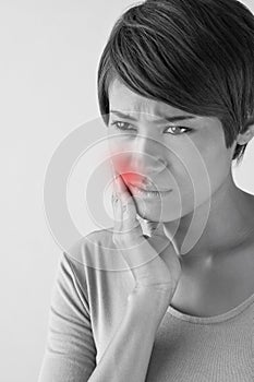 Worry woman with toothache, oral problem