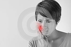 Worry woman with toothache, oral problem