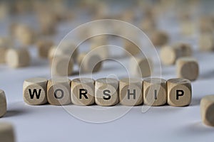 Worship - cube with letters, sign with wooden cubes