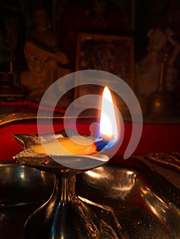 Worshipping hindu religion with oil lamps