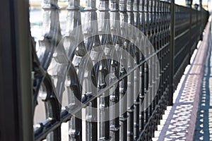 Wought iron fence with repeating pattern