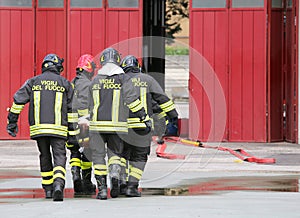 wounded carried by firefighters on a stretcher