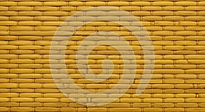 Woven bamboo pattern, featuring uniformly interlaced strips. The texture is smooth