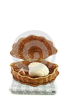 Woven basket, towel and soap