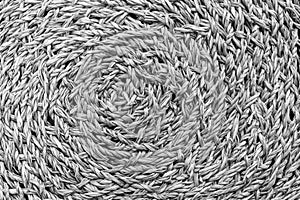 Woven black and grey wicker straw background or texture