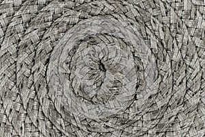 Woven black and grey wicker straw background or texture