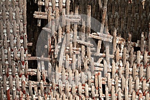 Woven chair caning, broken rattan and peeling paint, texture background