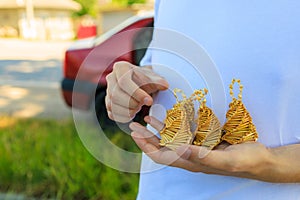 Woven decorative straw bells. Background with selective focus and copy space