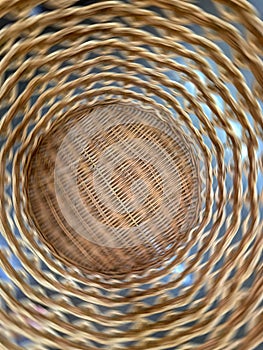 Woven easter basket with circular pattern.