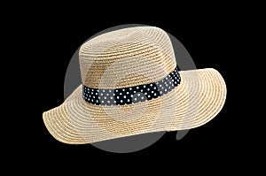 Woven fedora hat isolated on black background