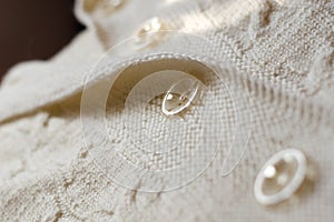 Woven handicraft knit white cardigan detail