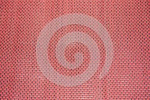 Patterns knit on the red mat.