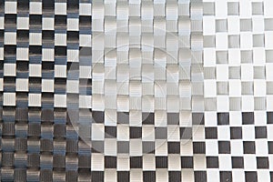 Woven plastic background in black and white