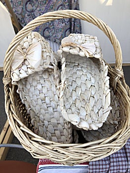 Woven straw slippers in rustic style