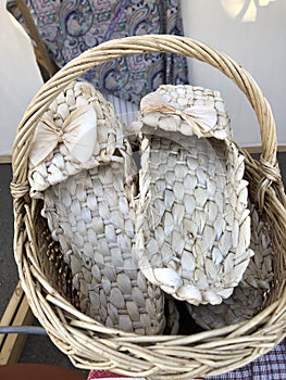 Woven straw slippers in rustic style