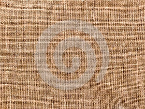 Woven synthetic jute carpet backing pattern as background