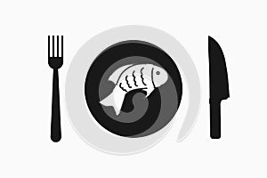 Fish in plate with fork and knife solid icon.