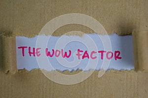 The Wow Factor Text written in torn paper
