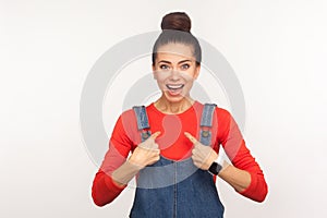 Wow, this is me! Portrait of surprised girl pointing herself, being proud and shocked by her achievements