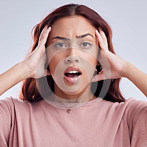 Wow, mistake and young woman in studio with hand on head for anxiety, stress or panic. Portrait and face of a shocked