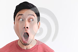 Wow and shocked face of funny man isolated on white background.