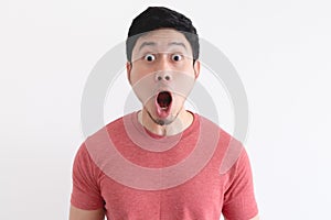 Wow and shocked face of funny man isolated on white background.