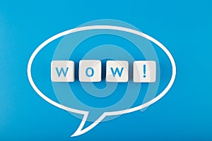 Wow speech bubble on blue background