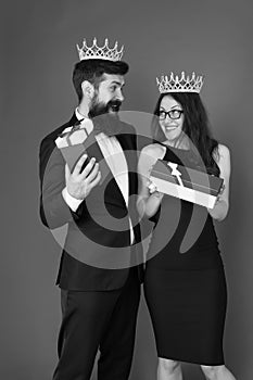 Wow. Surprised king and queen. Business couple got surprise reward. Bearded man and sexy woman hold surprise boxes