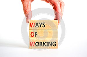 WOW ways of working symbol. Concept words WOW ways of working on wooden blocks on a beautiful white table white background.