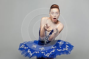 Wow, is that you? Portrait of beautiful ballerina woman in blue