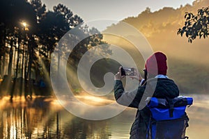 Wowen traveler at morning sunrise at Pang Ung