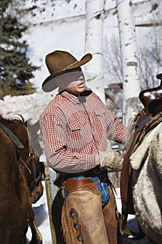 Wrangler with horses.