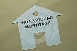 Wraparound Mortgage write on paper house isolated on office desk