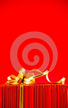 Wrapped box against red background