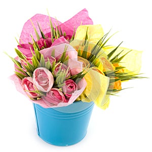 Wrapped flowers in a bucket