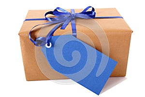 Wrapped package or parcel, blue gift tag or label, isolated on white photo