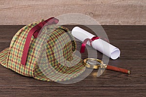 Wrapped paper sheets and magnifying glass