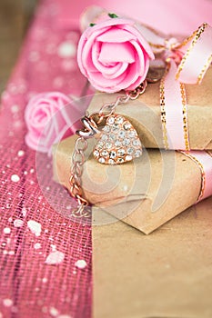 Wrapped in parchment paper, delicate fresh pink flowers with golden heart