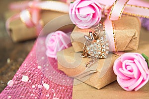 Wrapped in parchment paper, delicate fresh pink flowers with golden heart