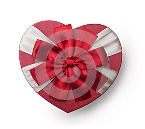 Wrapped vintage heart gift box with red ribbon bow, isolated clipping mask on white background, top view, illustration