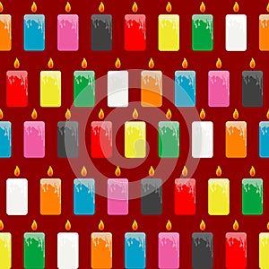 Wrapping papaer with colored candles on red  background