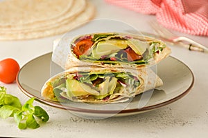 Wraps or torttila. Avocado, vegan wrap sandwiches. Healthy food photo