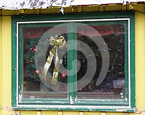 Wreath in Abandoned Gift Shop Window