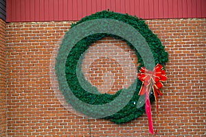 Wreath on a Brick Wall photo